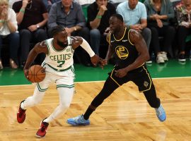 Jaylen Brown from the Boston Celtics blows by Draymond Green of the Golden State Warriors in Game 3 of the NBA Finals at TD Garden. (Image: Getty)