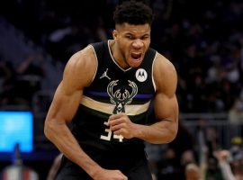 Gannis â€˜Greek Freakâ€™ Antetokounmpo from the Milwaukee Buck flexes after hitting a big 3-pointer against the Chicago Bulls in a Central Division battle. (Image: Getty)