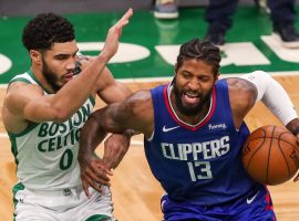 Jayson Tatum from the Boston Celtics defends Paul George of the LA Clippers. (Image: Getty)