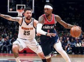 Austin Rivers (25) from the Denver Nuggets defends Kentavious Caldwell-Pope last season when KCP played for the Washington Wizards. (Image: Porter Lambert/Getty)