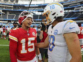 Patrick Mahomes from the Kansas City Chiefs chats up Justin Herbert of the LA Chargers after an AFC West division game during Hebertâ€™s rookie season. (Image: Getty)