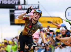 A drained yet exhilarated Jonas Vingegaard secures his first-career stage victory in the Tour de France in Stage 12 at Col du Granon. (Image: Getty)